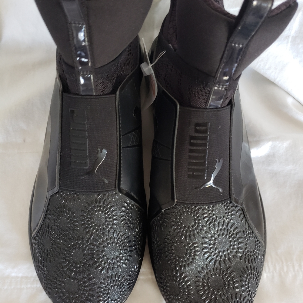 PUMA black fierce slip on, metallic core running sneakers.